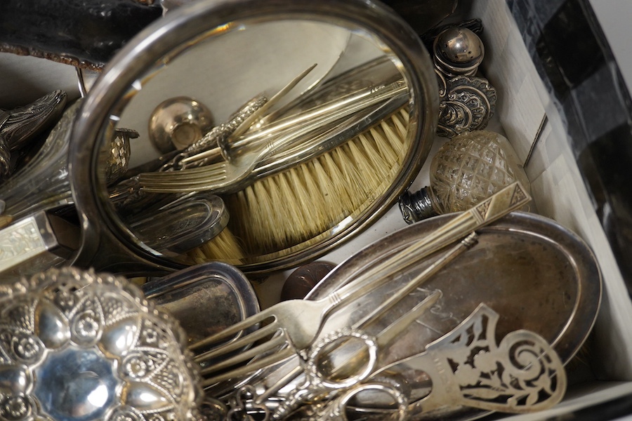 A group of assorted silver etc. including a mounted hand mirror and two brushes, two card cases (both a.f.), caddy spoon, fruit knife, page turners (a.f.), shoe pin cushion, cased folding comb and other mainly damaged it